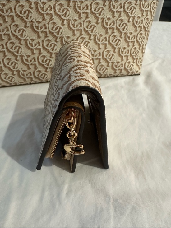 Coach Handbags - Coach Beige Monogram Signature Zip Wallet with Gold Hardware